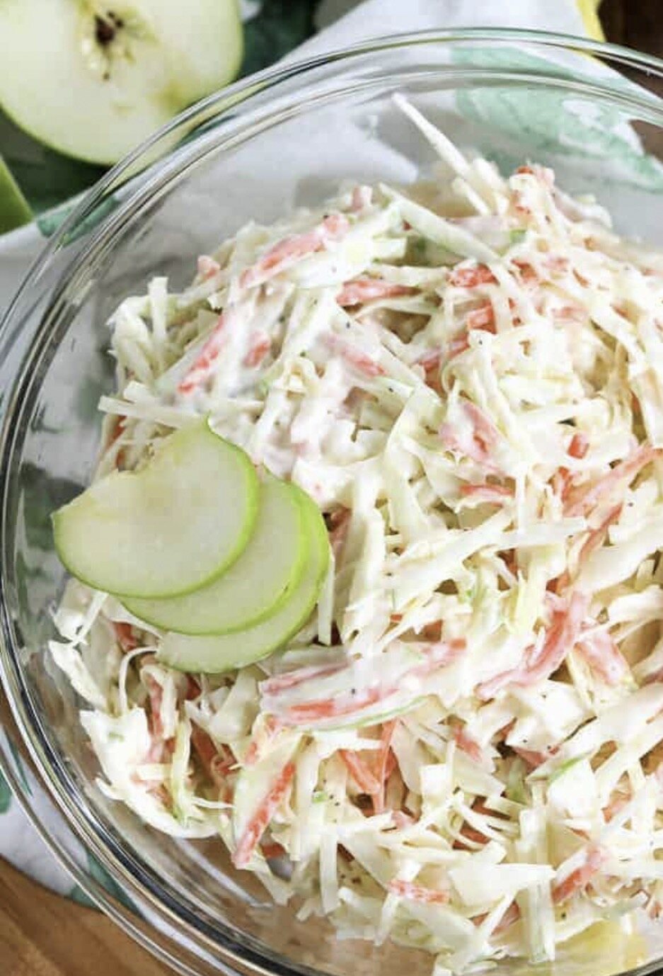 Representative serving of creamy apple coleslaw with sliced green apple