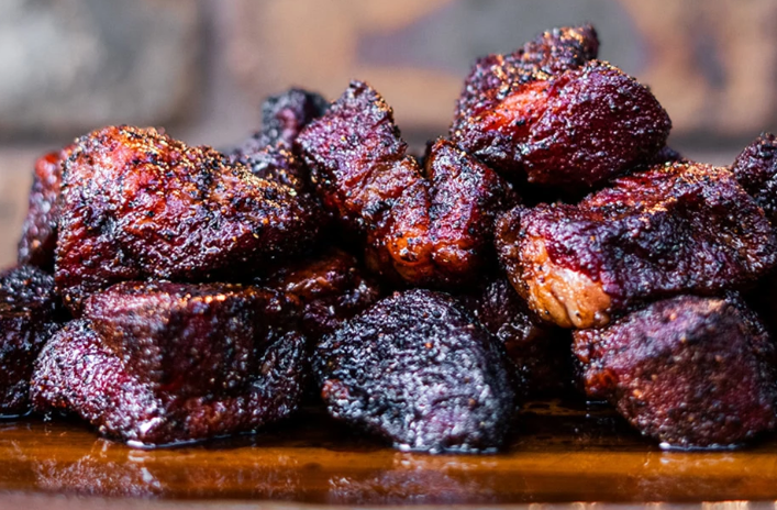 Saucy sweet beef burnt ends with dark caramelized bark and a sticky glaze